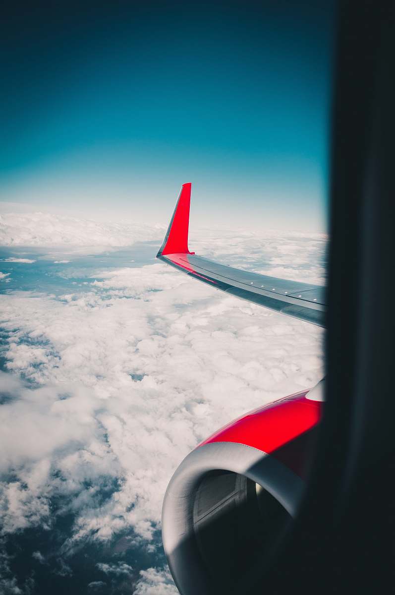 plane wing gray and red airplane flight